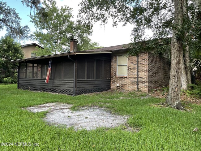 Building Photo - 5217 Secluded Oaks Ln