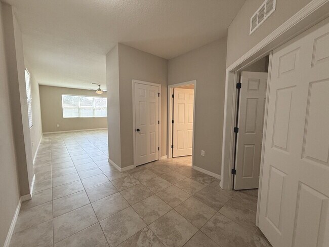 Building Photo - Spacious 4-Bedroom Retreat with additional office/den in the Heart of Trinity!
