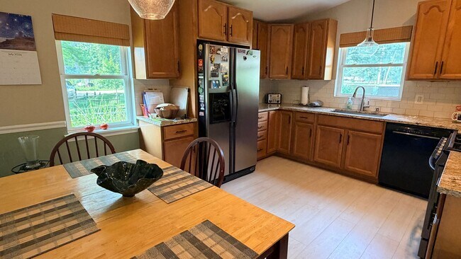 Building Photo - Riverfront Living on the Fox: 2 Bed, 1 Bath with Private Dock and Oversized Garage