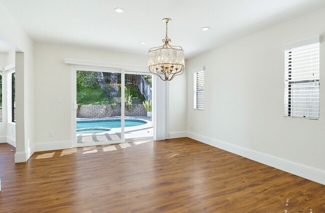 Building Photo - Stunning Upgraded 4BR Home with Pool in Desirable Rancho San Diego – Move-In Ready