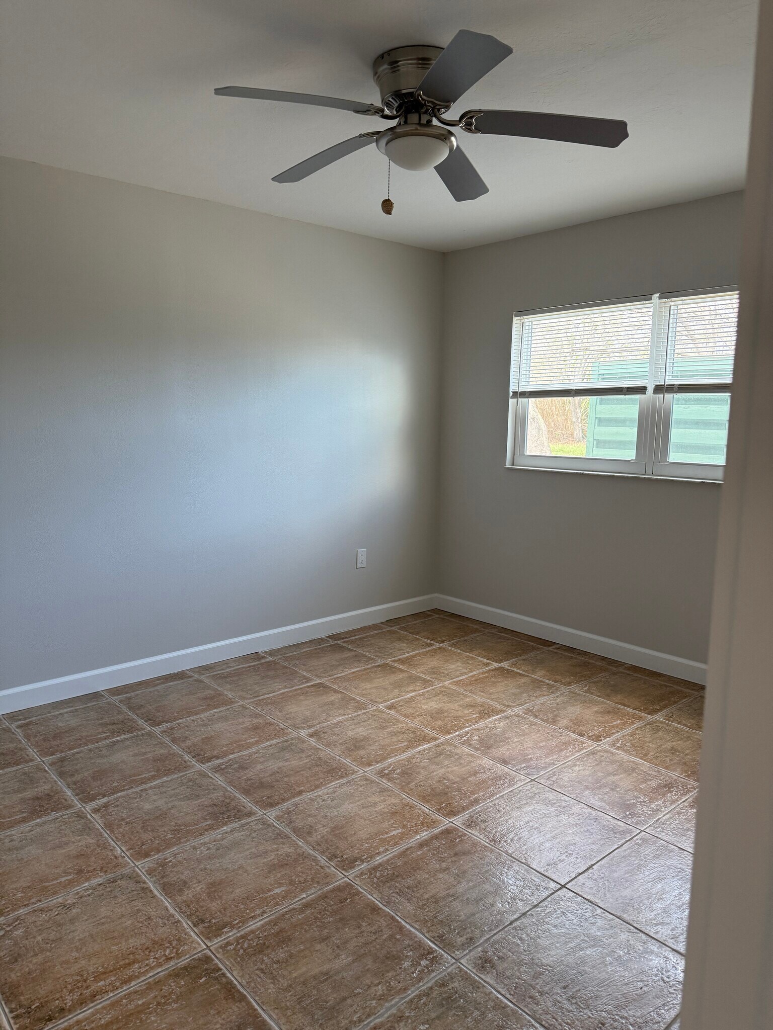 All tile flooring throughout. - 7006 Midnight Pass Rd