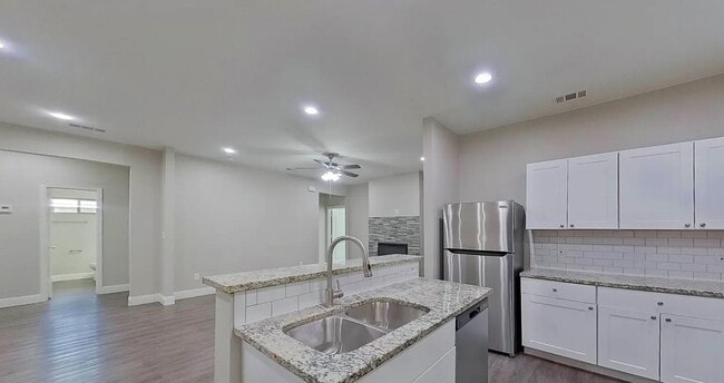 Building Photo - Spacious, Stylish, and Simply Perfect — 4 Bedroom Home