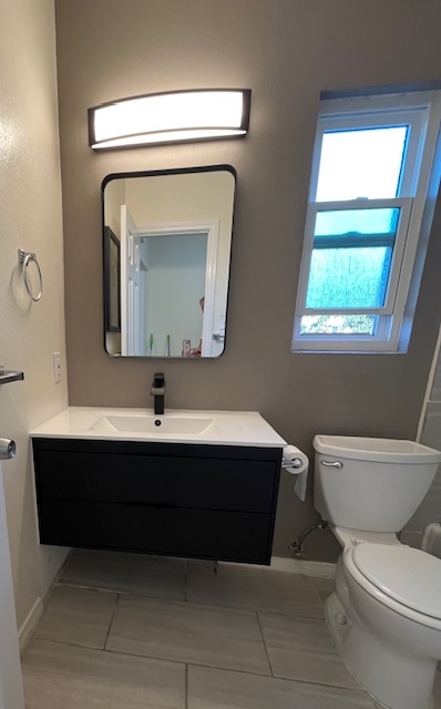 Updated 'floating' sink vanity - 4033 Van Dyke Ave