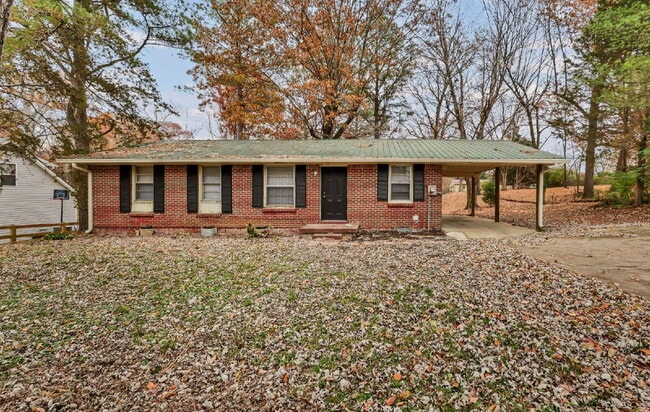 Building Photo - Cozy 3BR Home with Spacious Yard & XL Carport!