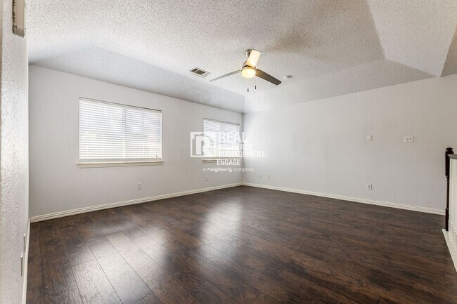 Building Photo - Recently Updated Plano Property with Modern Features and Serene Surroundings