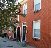 Building Photo - Charming 2-Bedroom, 2-Bath Townhome with Historic Character and Private Patio Near Fells Point