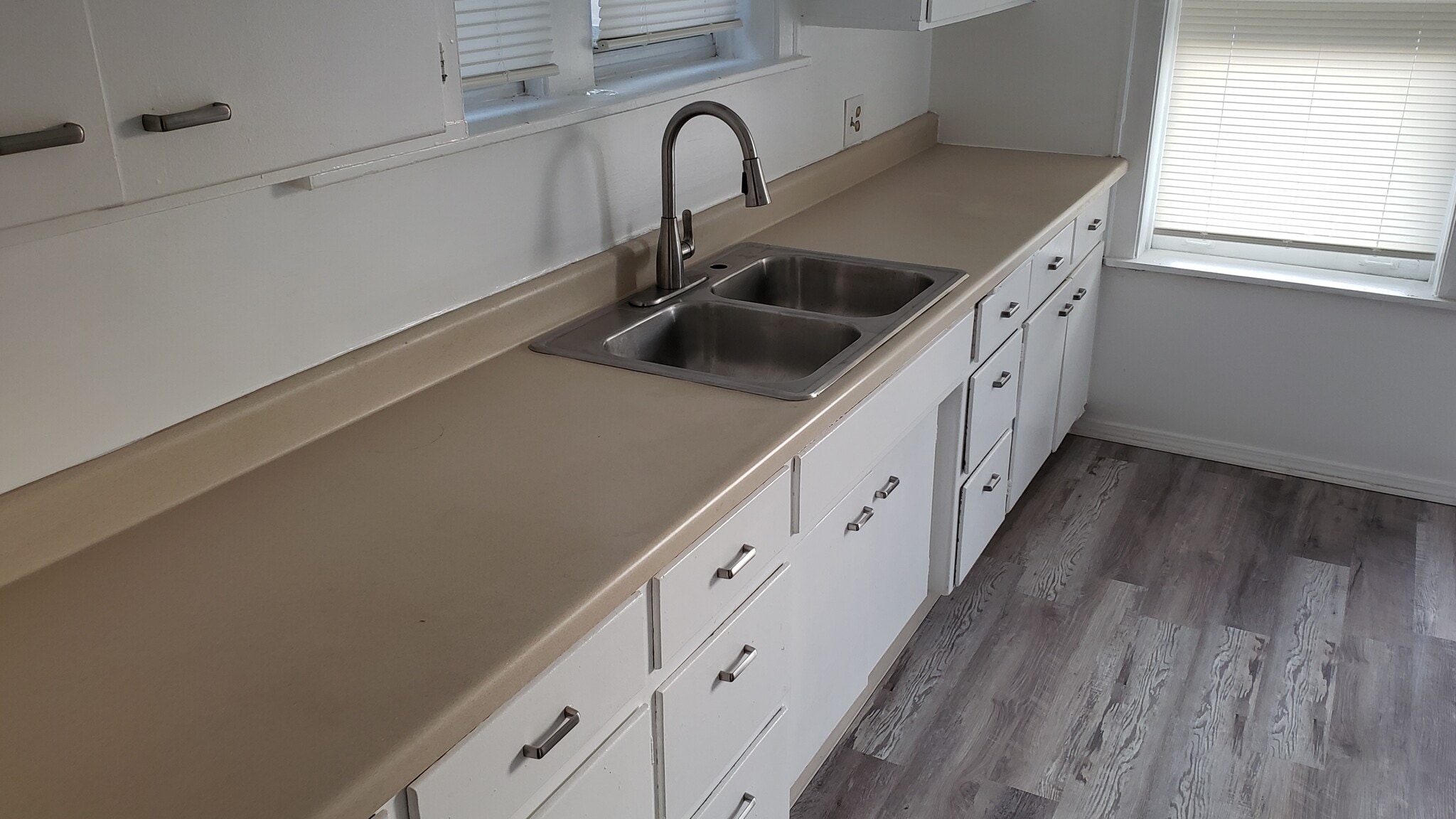 New kitchen floor. - 7918 Karlov Ave