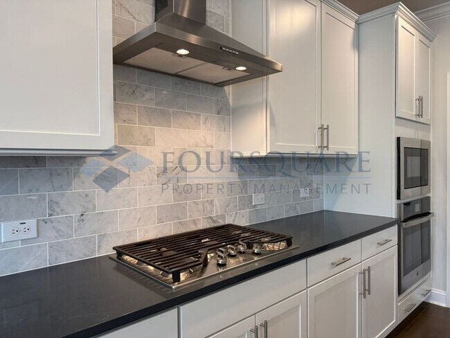 Building Photo - Spacious Corner-Lot Home with Guest Suite, Screened Porch & Detached 2-Car Garage – Resort-Style ...