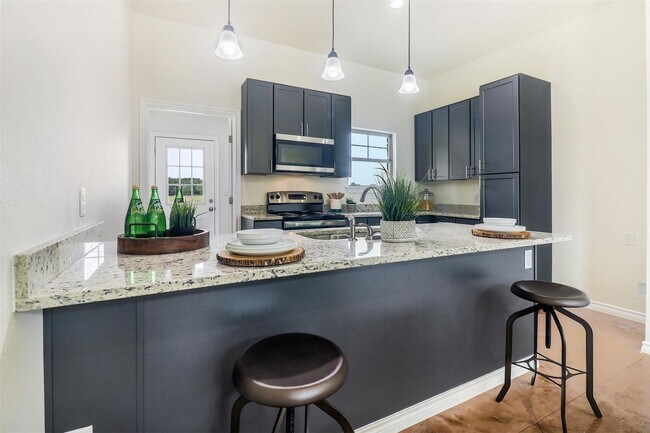 Building Photo - Charming 3-Bedroom Townhome near Lake Tawa...