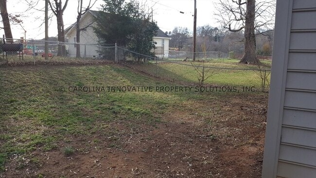 Building Photo - 1409 Tinnin Ave