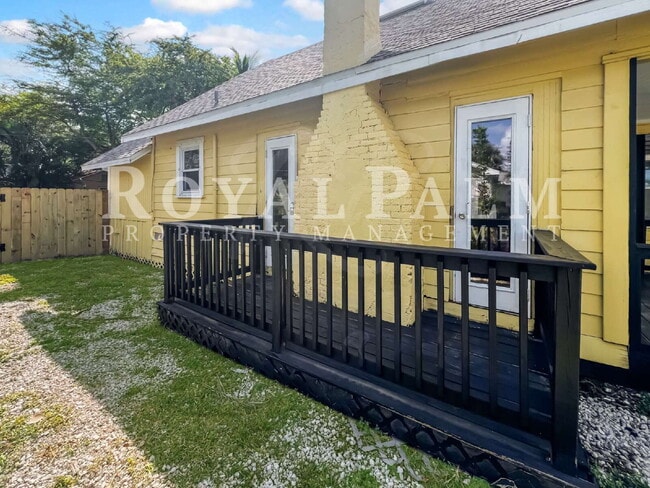 Building Photo - Deck the halls or the French doors, because this charming century-old single family home is avail...