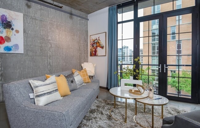 Building Photo - Rare Availability in the Streetcar Lofts, Parking, and Some Utilities Included