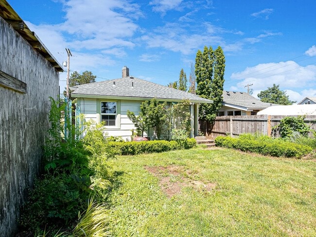 Building Photo - Adorable, vintage 1924 2-bdrm/1-bath w/ fenced yard, raised beds, & chicken house—Great location ...