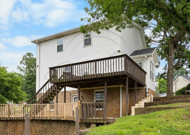 Building Photo - Four Bedroom Two Story with Two Car Garage...