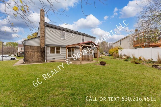 Building Photo - ***  SCHOOL DISTRICT 73 / 4 BDRM + DEN / 2...