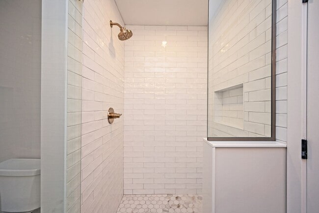 Building Photo - Stylish, Sustainable & Low-Maintenance Liv...