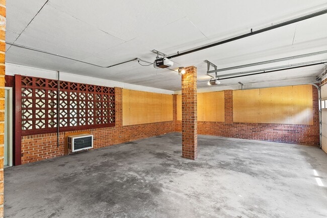 Building Photo - Large 4-Bed Brick Rancher with 2-Car Attached Garage!