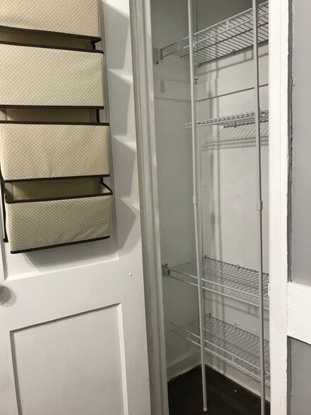 Hanging storage for additional storage on closet door - 1407 W Church St