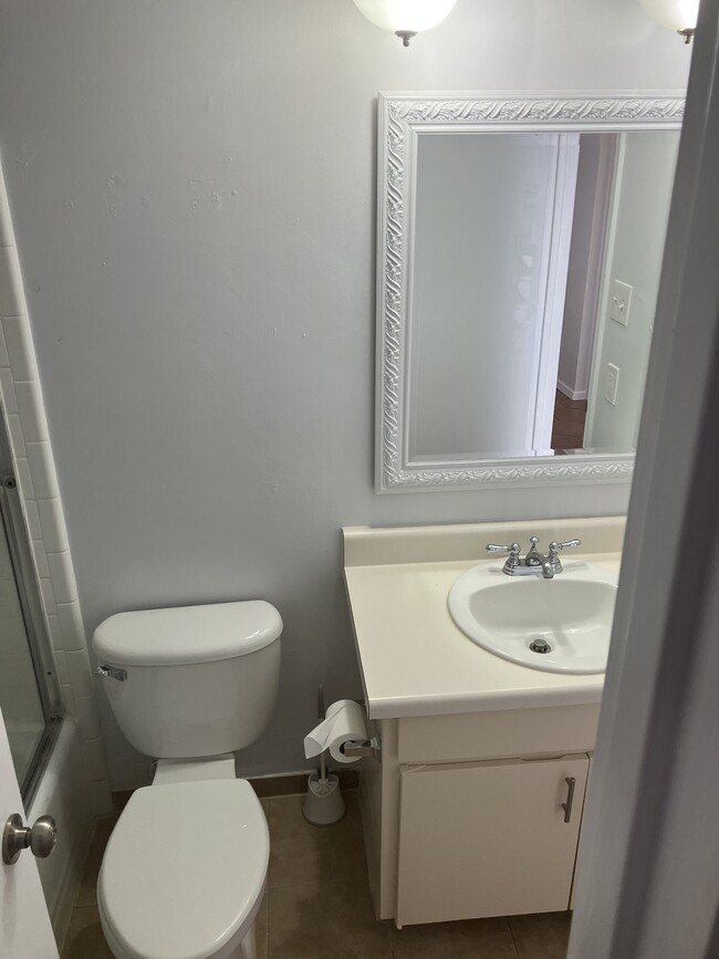 Keeping it simple and clean with the guest accessible and private accessible bathroom. - 13559 Red Fern Ln