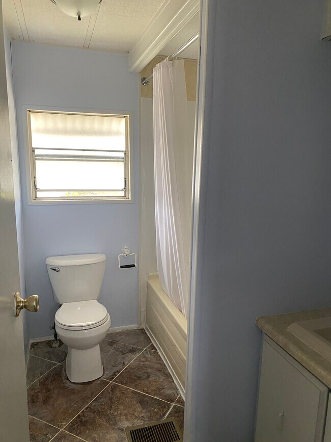 Bathroom connected to bedroom and hallway - 7306 43rd Way N