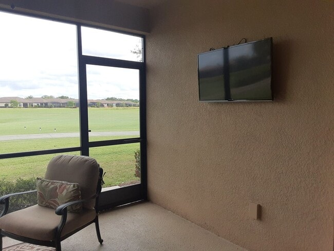 Building Photo - Seasonal/short term turnkey furnished Incredible 2/2 with den ground floor condo in resort Esplan...