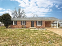 Building Photo - 3 bed with carport and garage