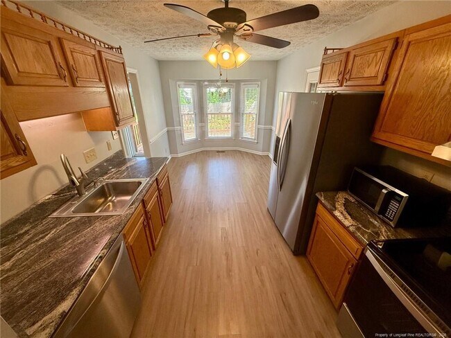 Building Photo - 7136 Kearny Ave