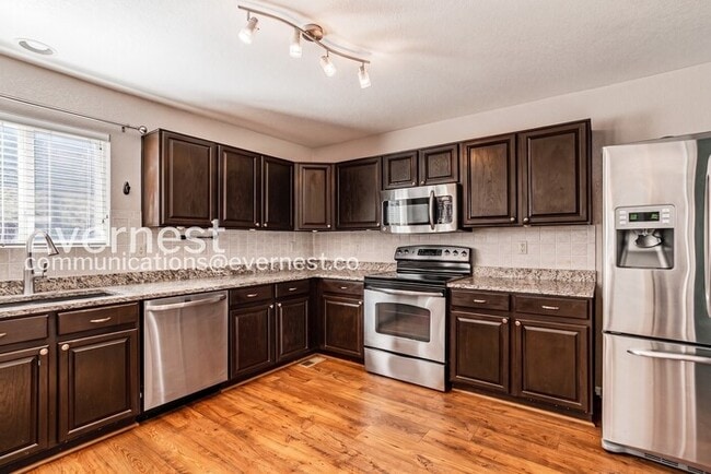 Building Photo - Spacious Home with Fenced Backyard and 2-Car Garage / 4 Bed, 3 Bath  / Voucher Accepted / Coming ...