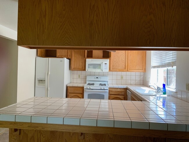Building Photo - Spacious 3-Bedroom Home with Greenbelt Views & Landscaping Included
