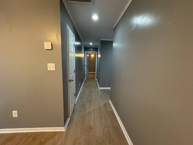 Building Photo - Spacious 4-Bedroom Sanctuary with Cozy Fireplace on Chimney Swift Drive!