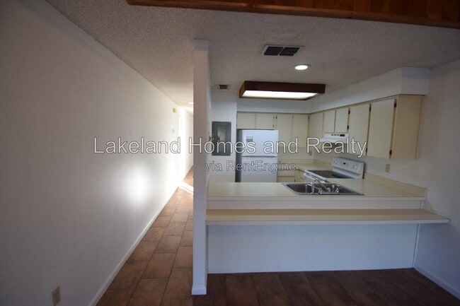 Building Photo - 6055 Topher Trail