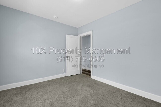 Building Photo - 1311 E 24th Ave