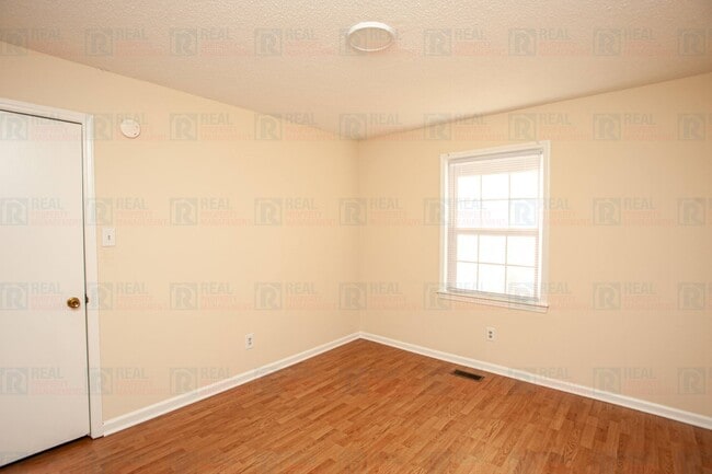 Building Photo - 8722 Rollingwood Rd