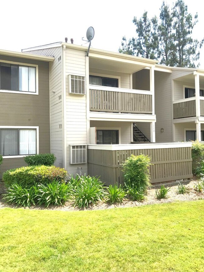 Building Photo - Ground Level 2 Bedroom Condo with Private Patio in Gated Community for Lease