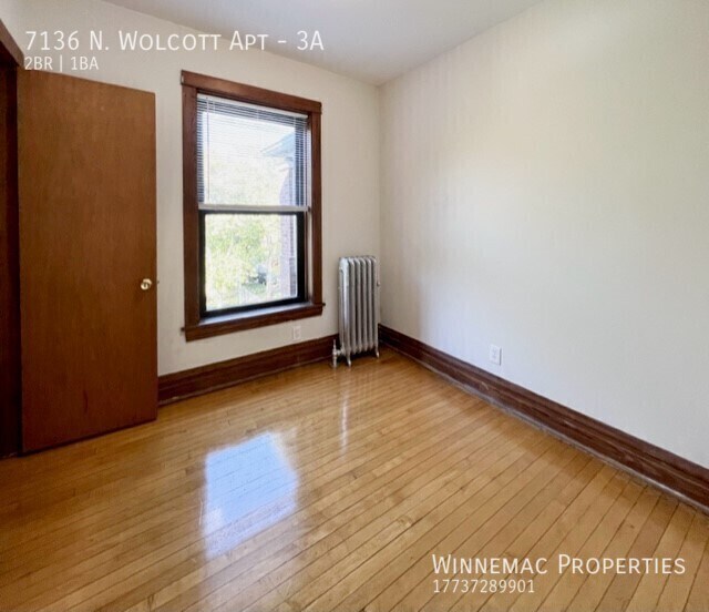 Building Photo - 7136 N Wolcott Ave