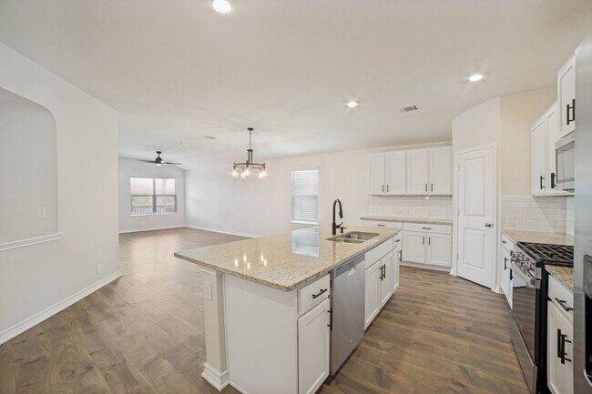 Building Photo - Welcome home to this 4/2/2 nestled in Whisper Falls