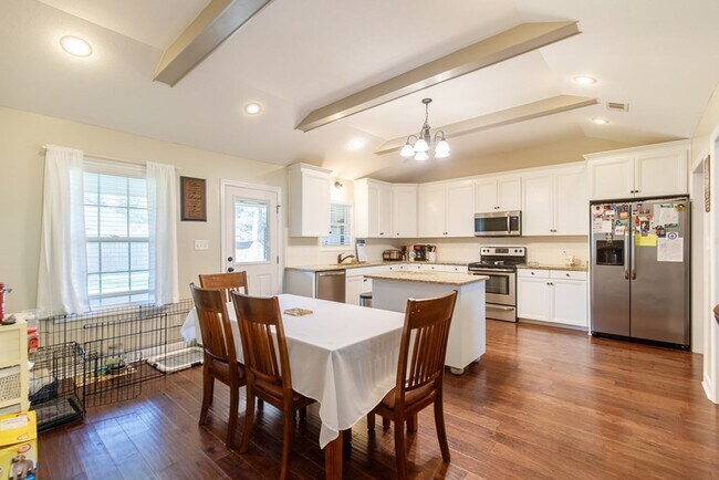 Building Photo - Modern 4-Bedroom Home with Screened Porch ...