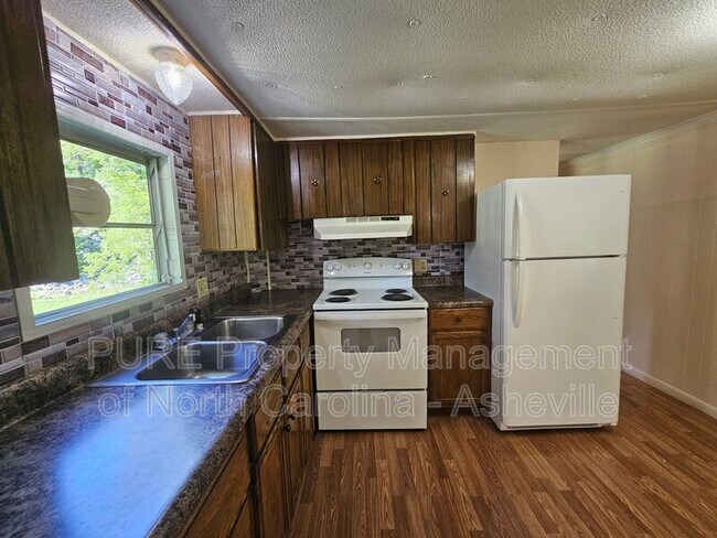 Building Photo - 3875 Old Fort Sugar Hill Rd