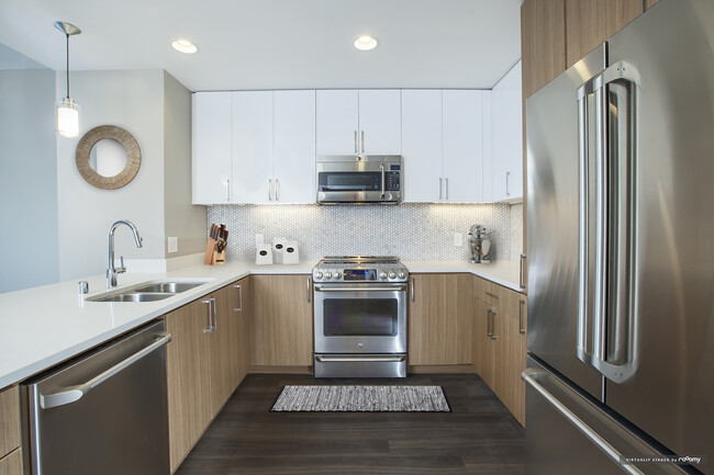 Signature Collection Kitchen with Quartz Stone Countertops - Avalon Towers on the Peninsula