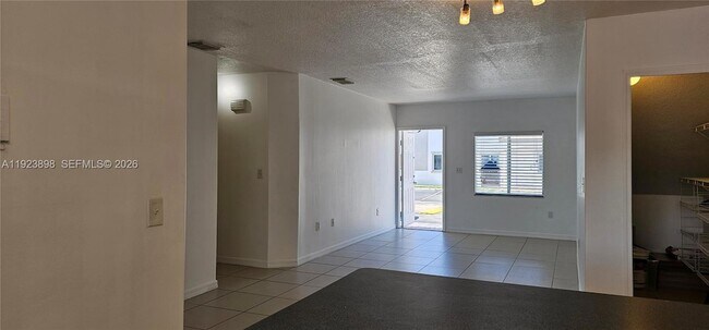 Building Photo - 5675 NW 109th Ave