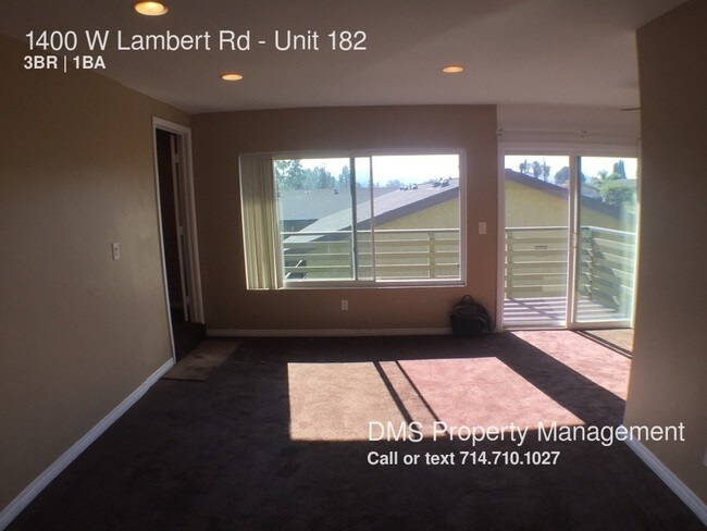 Building Photo - 1400 W Lambert Rd