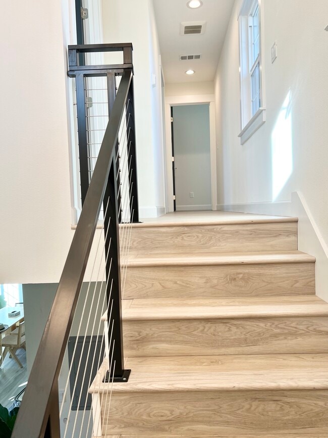 Modern staircase railing - 392 N 7th St