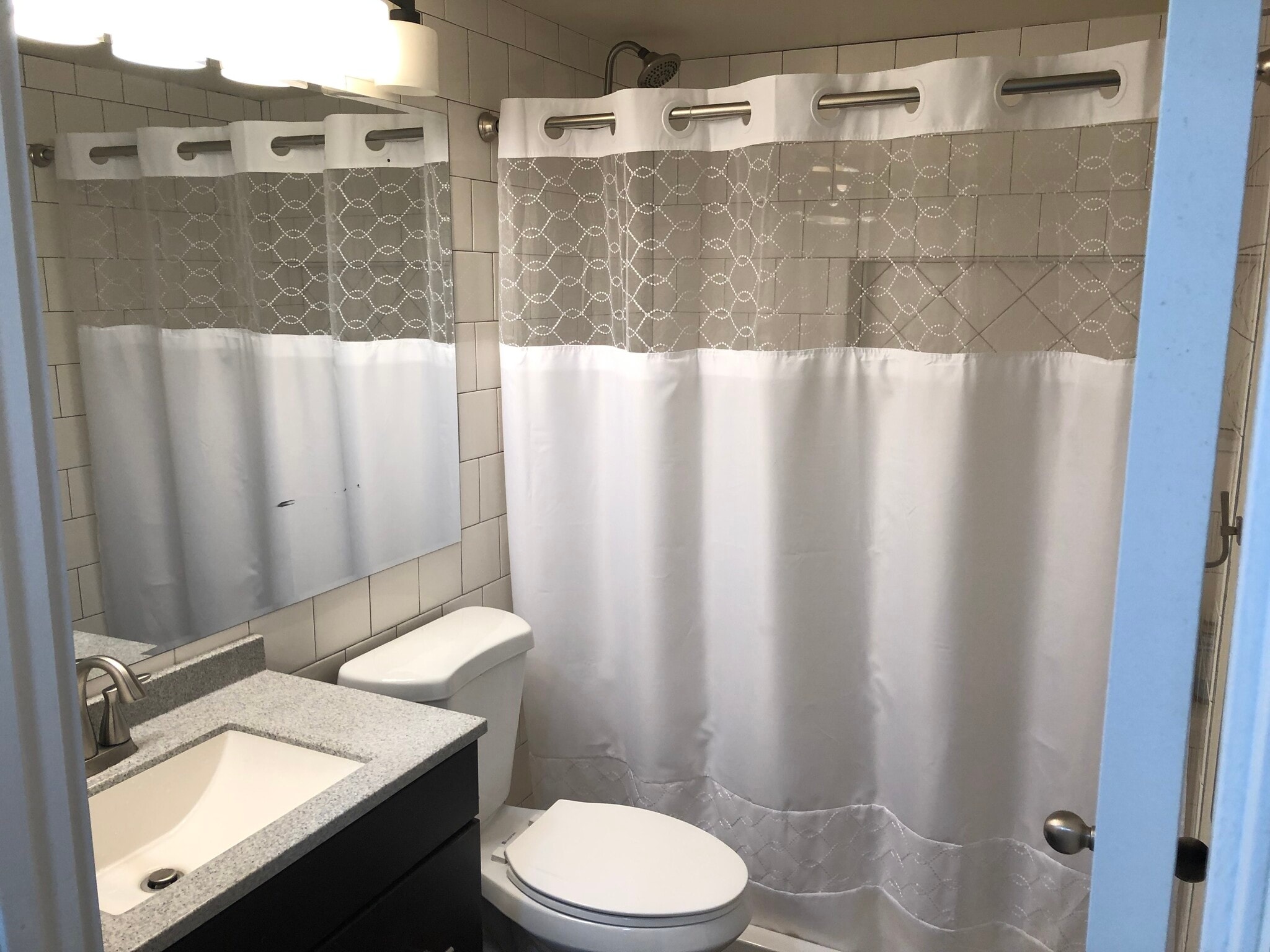 large walk in tiled shower. - 5252 NE 49th Ave