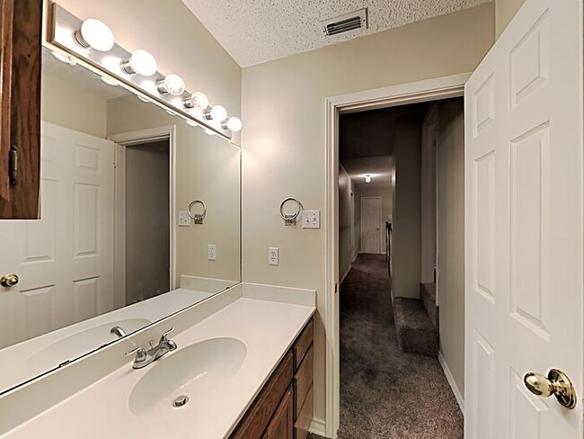 Building Photo - Move in before May 1st and get $1,000 OFF ...