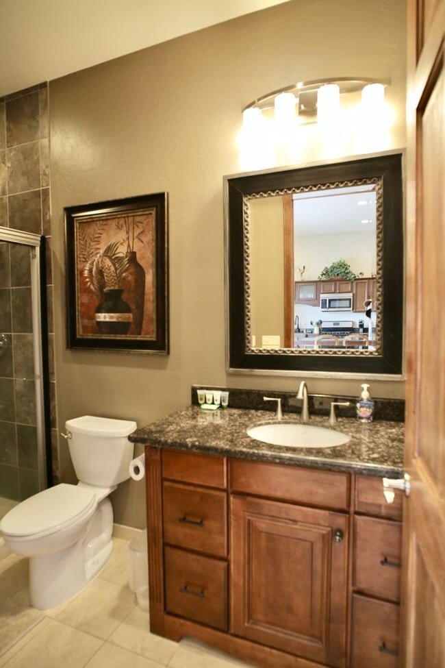 Building Photo - Mountain and City Views from this Furnishe...
