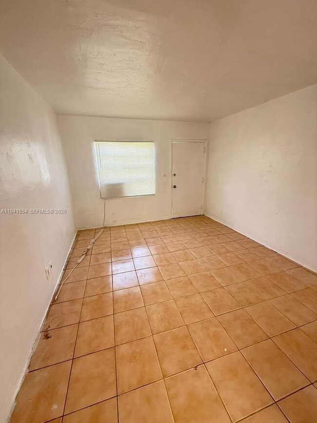 Building Photo - 6720 NW 6th Ct