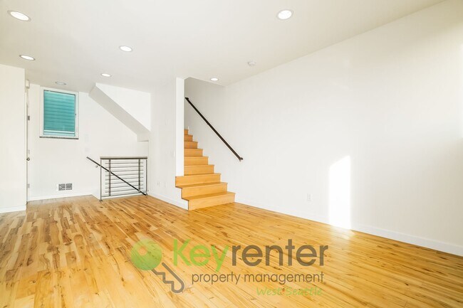 Building Photo - **Rent Special** Modern Two Bedroom Townhome with Designated Parking