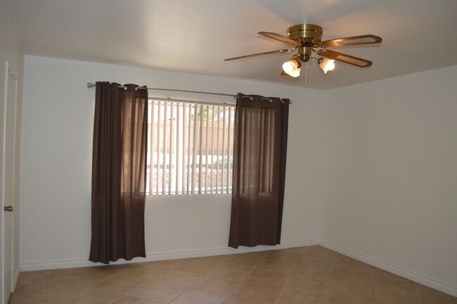 Building Photo - Four Bedroom, Two Bathroom Single Story Home With Two Car Garage