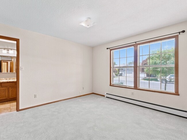 Building Photo - Spacious 2BR Rental with Open Floor Plan & Low-Maintenance yard
