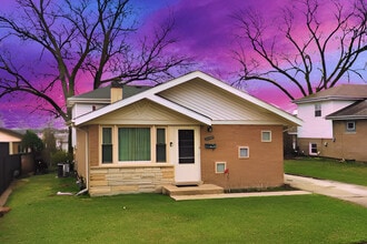 Building Photo - 12549 S Tripp Ave